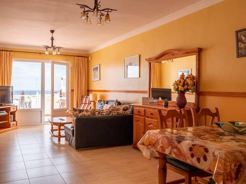 Bright living and dining area opening towards the terrace